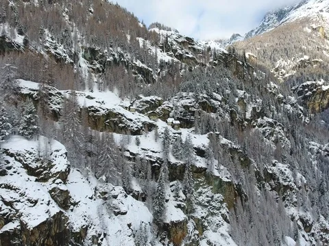 Aerial view over the forest in winter - Pastures and villages Stock Footage 72463853
