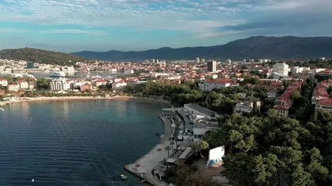 Aerial view over the  Grand Split city &amp; Bacvice Beach in summer morning Stock Footage 171828941