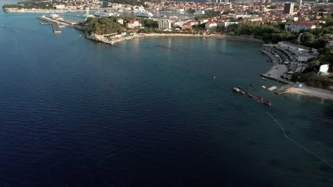 Aerial view over the  Grand Split city &amp; Bacvice Beach in summer morning Stock Footage 171829235