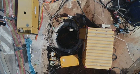 Aerial view over highway construction infrastructure. Men at work and Stock Footage 128930825