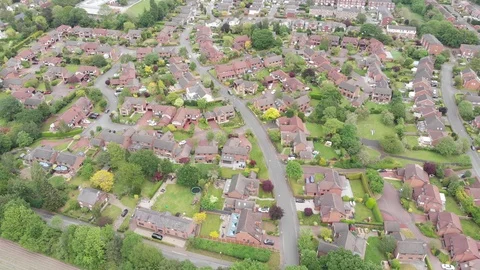 Aerial view over housing development 库存影片 119908061