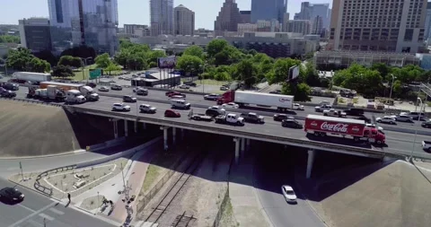 Aerial view over I-35 interstate highway traffic downtown Austin, Texas Stock Footage 211569071