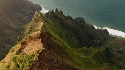 Aerial view over impressive steep mountain precipice of triangular shape at the Stock Footage 125652686