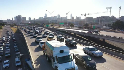 Aerial View over interstate I-35 during rush-hour traffic downtown Austin, Texas Stock Footage 146100290