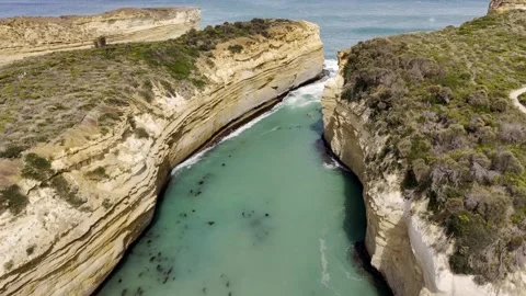 Aerial view over Loch Ard Gorge on the Great Ocean Road Stock Footage 309539063