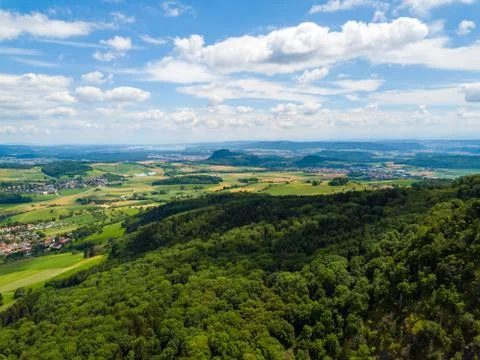 Aerial view over the long extinct volcanoes of the Hegau region towards Lake Stock Photos