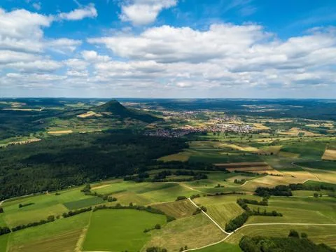 Aerial view over the long extinct volcanoes of the Hegau region near Lake Stock Photos