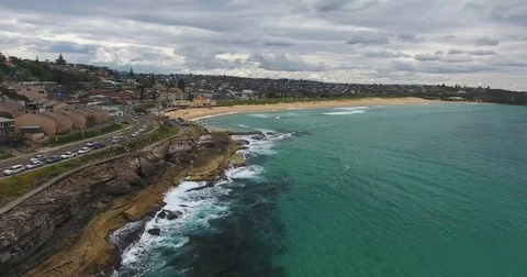 Aerial view over long sand beach in Curl Curl, Sydney Stock Footage 70825619
