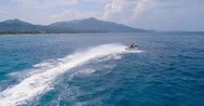 Aerial View Over Man Riding A Jet Ski At Tropical Paradise At Exotic Greek Stock Footage