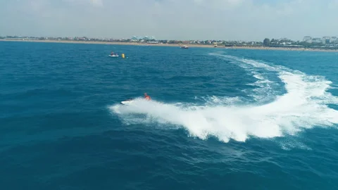Aerial View Over Man Speeding On Jet Ski Tourist Attraction Stock Footage 111798260
