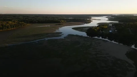 Aerial view over marshland and creeks beside the Potomac River Vídeos de archivo 345299766