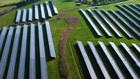 Aerial View Over Modern solar panel array in Fields in UK Stock-Footage 333064784