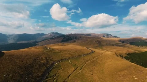 Aerial view over a mountain road Video stock 82393092