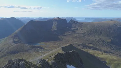 Aerial view over mountain top ridges Stock Footage 79659453