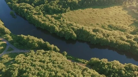 Aerial view Over the mountains to the river. Flight along a mountain river Stock Footage 73526534