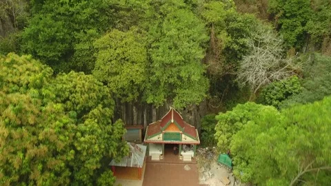 Aerial view over mountains with stone pillars and green vegetation, Cambodia Stock Footage 83535146