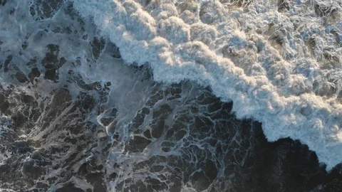 Aerial view over Ocean Beach at Sunset Stock Footage 88543900