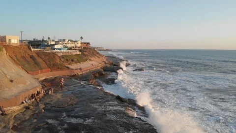 Aerial view over Ocean Beach at Sunset Stock Footage 88544076