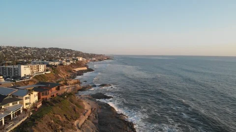 Aerial view over Ocean Beach at Sunset Stock Footage 88544084