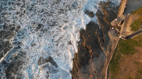 Aerial view over Ocean Beach at Sunset Stock Footage 88544279