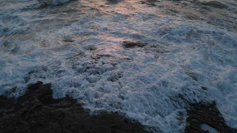 Aerial view over Ocean Beach at Sunset Stock Footage 88545381