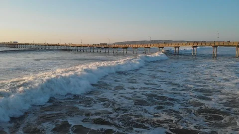 Aerial view over Ocean Beach at Sunset Stock Footage 88548340