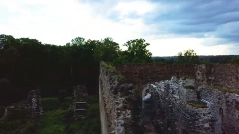 Aerial View Over Old Stoune Brick Wall of Raunas Castle Ruins in Latvia Stock Footage 136733124
