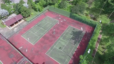 Aerial view over old tennis court Video stock 68350341