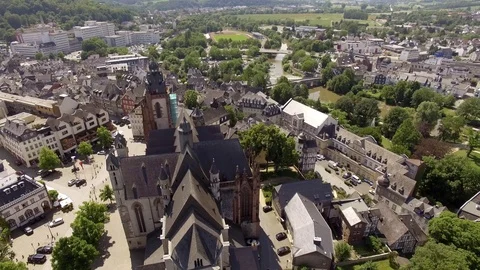 Aerial view over the old town of Wetzlarin germany camera flying close around Stock Footage 102822866