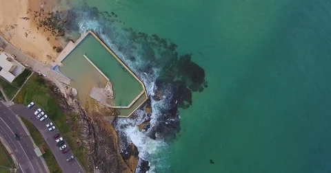 Aerial view over pool and sandy beach in Sydney, Australia Stock Footage 70826492