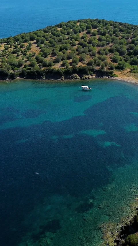 Aerial view over pristine turquoise sea cove and clear water, Greece Stock Footage 342238663