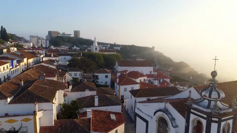 Aerial view over red tiled roofs in Obidos Stock Footage 108126731