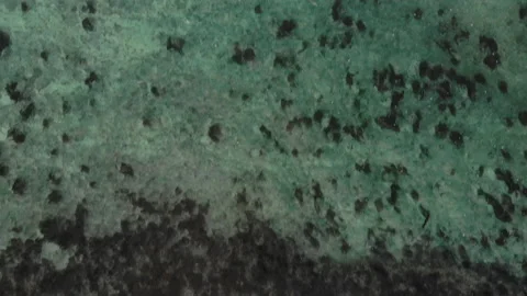 Aerial view over the reef in Samoa in the South Pacific Ocean Stock Footage 131200474