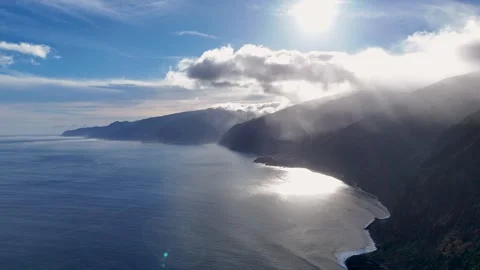 Aerial View Over Ribeira da Janela, with Sun Rays Cutting Through Thick White Stock Footage 304688183