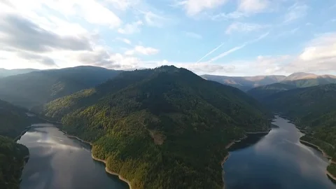 Aerial view over a river and mountains Video stock 71532142