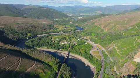 Aerial View Over River And Mountains In Nogueira Stock Footage 280042797