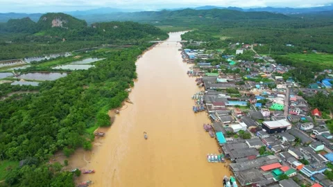 Aerial view over the river, harbor and fishing villages Stock Footage 201919025