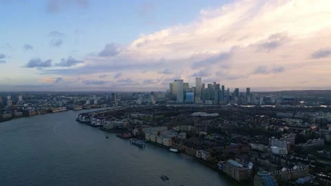 Aerial view over River Thames and Canary Wharf in London - LONDON, UK - DECEMBER Stock Footage 229507112