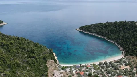 Aerial view over the rocky beach Leftos Gialos in Alonissos island, Sporades, Stock Footage 151735657