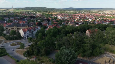 Aerial view over the rooftops and roundabouts of Blankenburg in the Harz Stockbeeldmateriaal 337978858