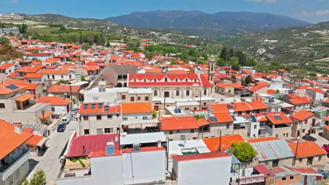 Aerial view over the rooftops of Omodos village in Cyprus. Stock Footage 341592200