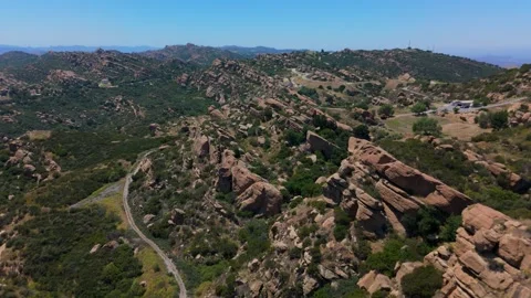 Aerial View Over Rugged Boulder Ridge in Sage Ranch Park Stock Footage 340110439