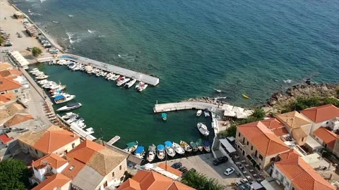 Aerial view over the seaside village Agios Nikolaos, in Mani, Messenia, Greece Stock Footage 138317095
