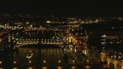 AERIAL: View over Seine River in Paris, France at Night with Shining City lights 스톡 동영상 128039005