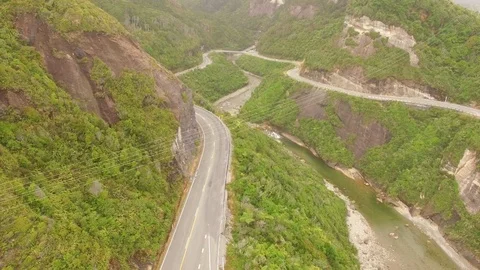 Aerial view over a serpentin mountain road, New Zealand Stock Footage 101370210