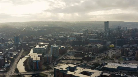 Aerial view over Sheffield City, South Yorkshire during a beautiful cold sunrise Stock Footage 120649341