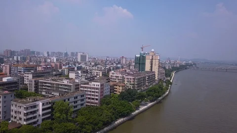Aerial view over a small developing town 動画素材 108602772