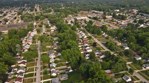 Aerial view over the small town sleeping area houses complex of landscape above Stock Footage 140676294