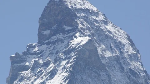 Aerial View over Snow-capped Mountain Peak Matterhorn with Clear Sky Видео 127152869