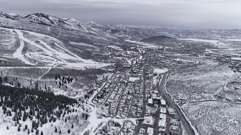 Aerial view over snow covered ski town Park City, Utah home of Sundance Video stock 85202402